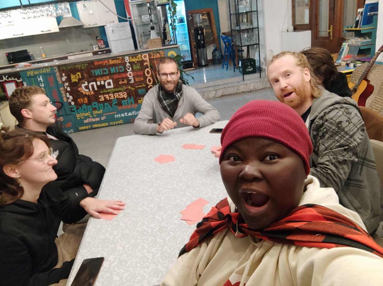 Mary Job with fellow backpackers playing a game in the city of Durress, Albania